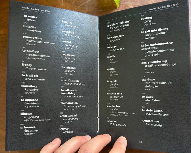 The dark mode book flipped open on some page.