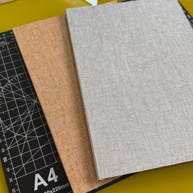 The two finished perfect-bound notebooks.