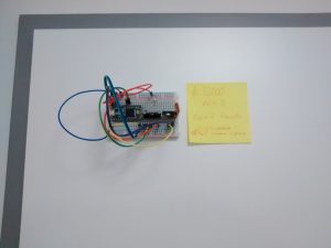 The acceleration sensor, a Teensy 3.2 microcontroller and a wireless transmitter -- attached to the entrance.
